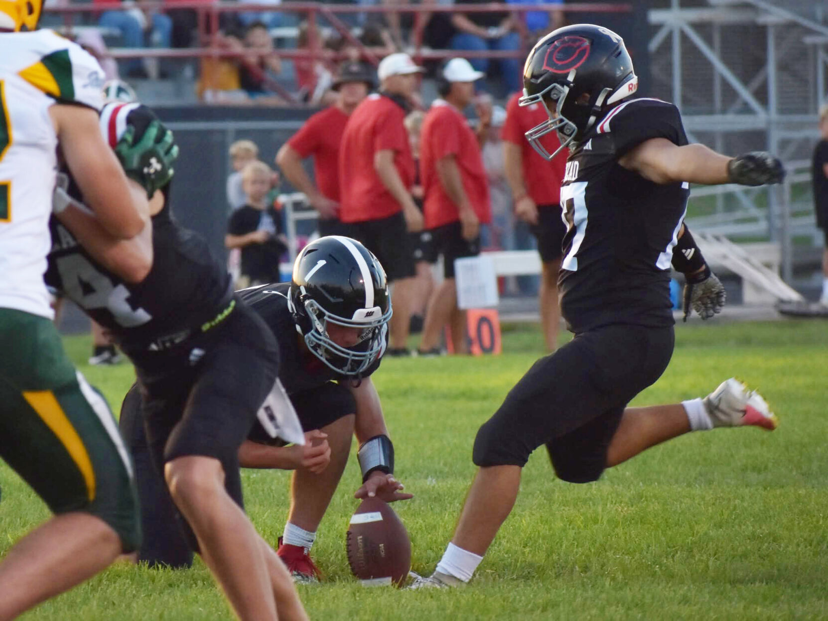 Cozad wins home opener in big fashion PAGE B1