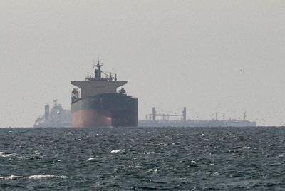 FILE PHOTO: Cargo ships in the Gulf, near the Strait of Hormuz (copy)