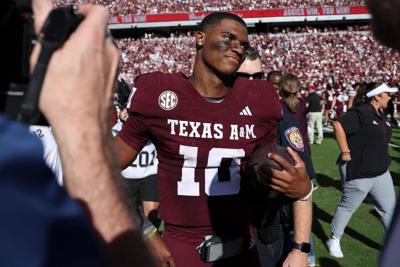 Nov 15, 2025; College Station, Texas, USA; Texas A&M Aggies quarterback Marcel Reed (10) walks on the field after the game against the South Carolina Gamecocks at Kyle Field. Mandatory Credit: Troy Taormina-Imagn Images