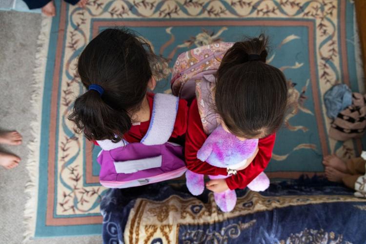 COPYRIGHT RESTRICTED Refugee SNAP Cuts