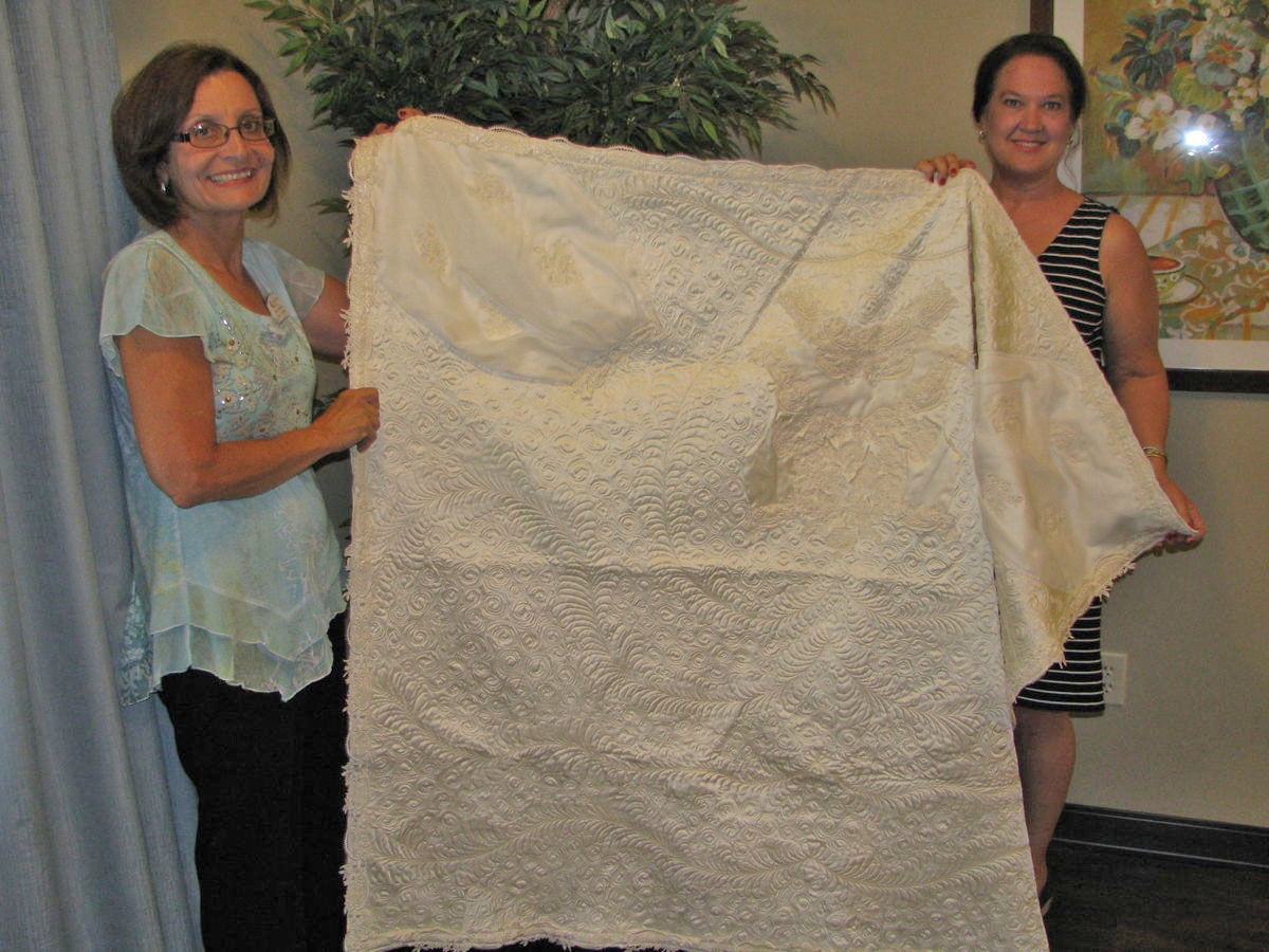 Wedding dress gets new life as quilt