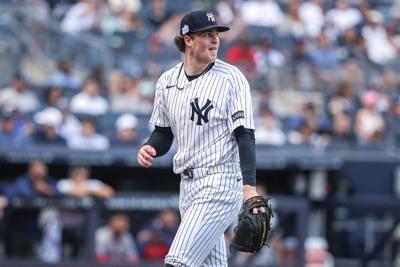 New York Yankees starting pitcher Cam Schlittler (31) reacts after retiring the side in the fifth inning against the Boston Red Sox at Yankee Stadium.