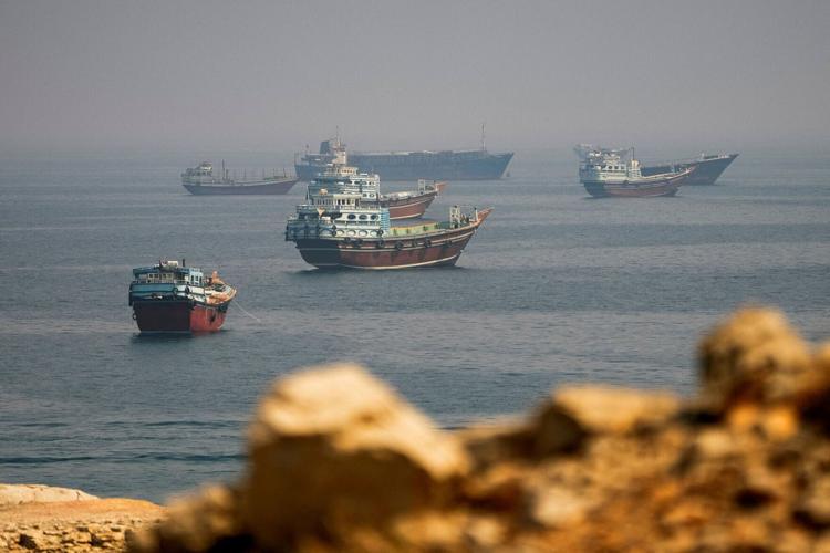 FILE PHOTO: Vessels near the Strait of Hormuz, as seen from Musandam