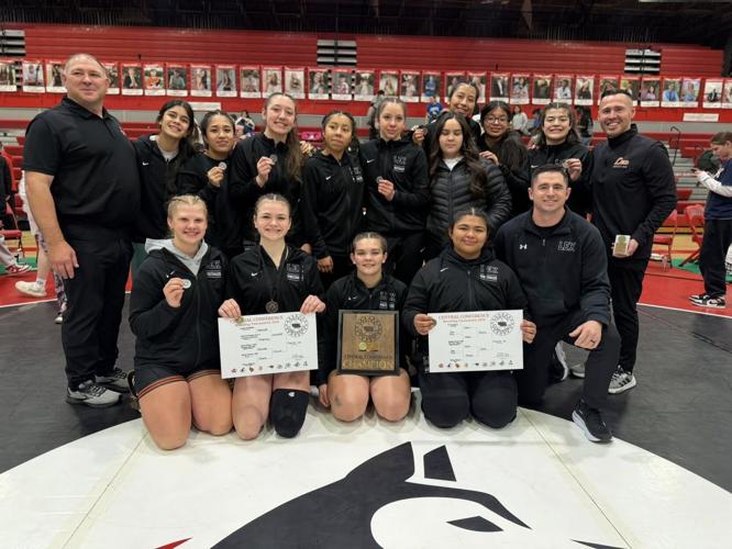 Maids win conference wrestling title