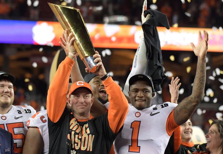 Clemson football coach Dabo Swinney celebrates with his team after defeating Alabama 44-16 in the College Football Playoff national championship game on Jan. 7, 2019.