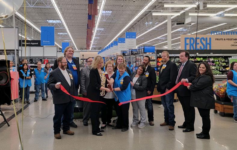 Walmart staff welcomes customers to remodeled Richardson location