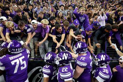 Northwestern players celebrate with the student section after a 34-13 victory against Penn State at the new Ryan Field on Oct. 2, 2026, in Evanston, Illinois.