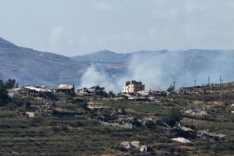 Smoke rises near destroyed structures in southern Lebanon, as seen from the Israeli side of the Israel-Lebanon border, in northern Israel