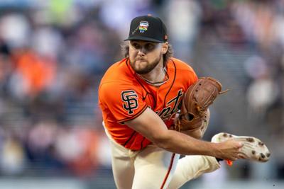 San Francisco Giants starting pitcher Landen Roupp throws against the Chicago Cubs during the first inning at Oracle Park.
