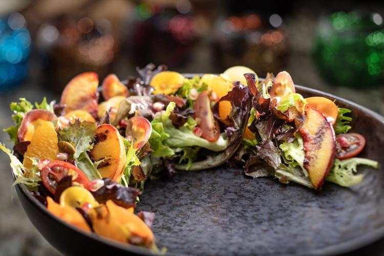 The Jiko Salad – Lolla Rosa lettuce, seasonal apples, pickled shallots with Baobab Vinaigrette.