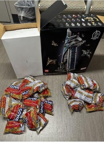 Police say Jarell Augustine of California allegedly purchased Lego sets from Target and then returned them with pasta inside.