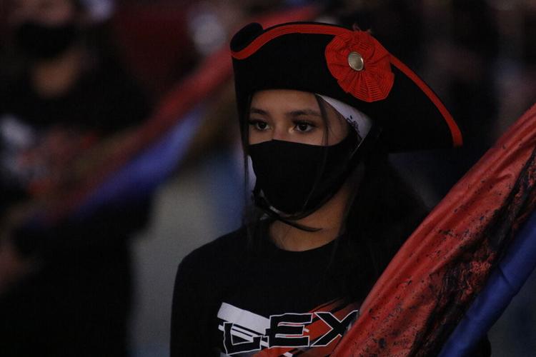 With no competitions to attend, Pride of the Minuteman Marching Band performs for the Lexington community