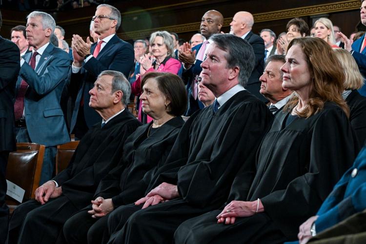 From left, Supreme Court Chief Justice John G. Roberts Jr., Justice Elena Kagan, Justice Neil Gorsuch and Justice Amy Coney Barrett watch as President Donald J. Trump delivers the first State of the Union address of his second term to a joint session of Co