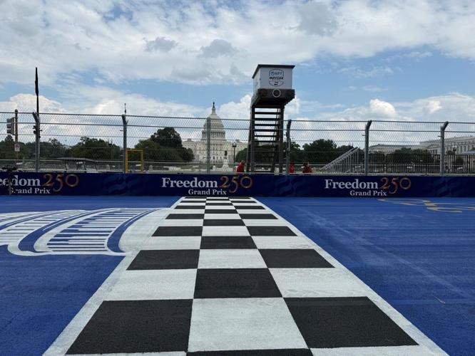 The start/finish line at the IndyCar Freedom 250 highlights the U.S. Capitol building.