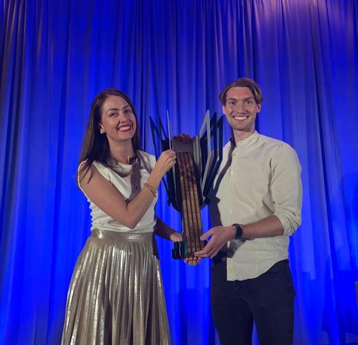 Adriana and Stephen accept award