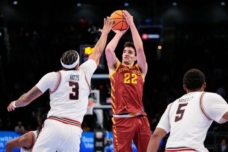 Iowa State forward Milan Momcilovic (22) shoots the ball over Texas Tech forward LeJuan Watts (3) during the 2026 Big 12 tournament at T-Mobile Center in Kansas City, Mo.