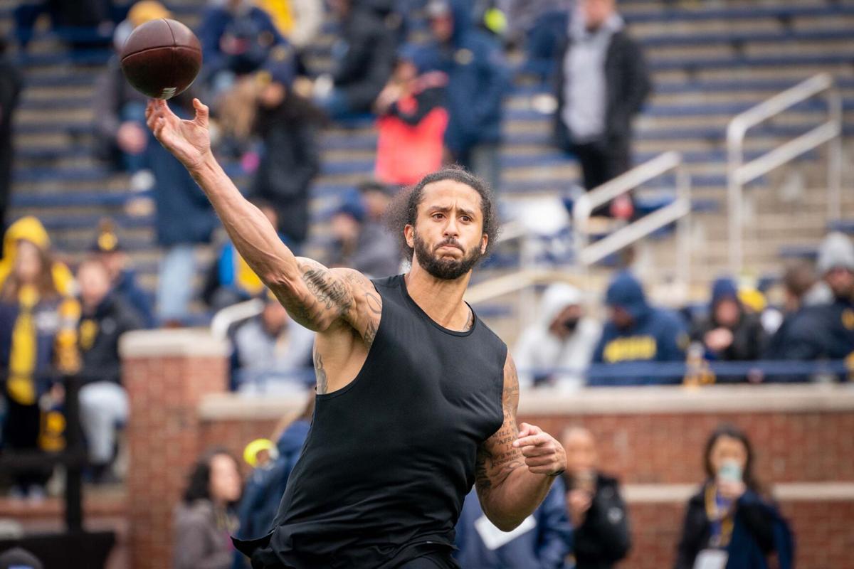 Colin Kaepernick participates in a throwing exhibition at halftime in the Michigan spring football game at Michigan Stadium on Saturday, April 2, 2022, in Ann Arbor, Michigan.