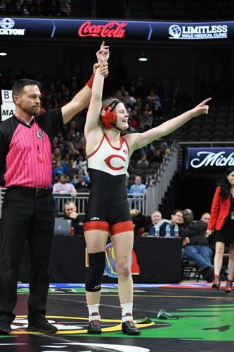 Negley wins second wrestling gold medal PAGE B1