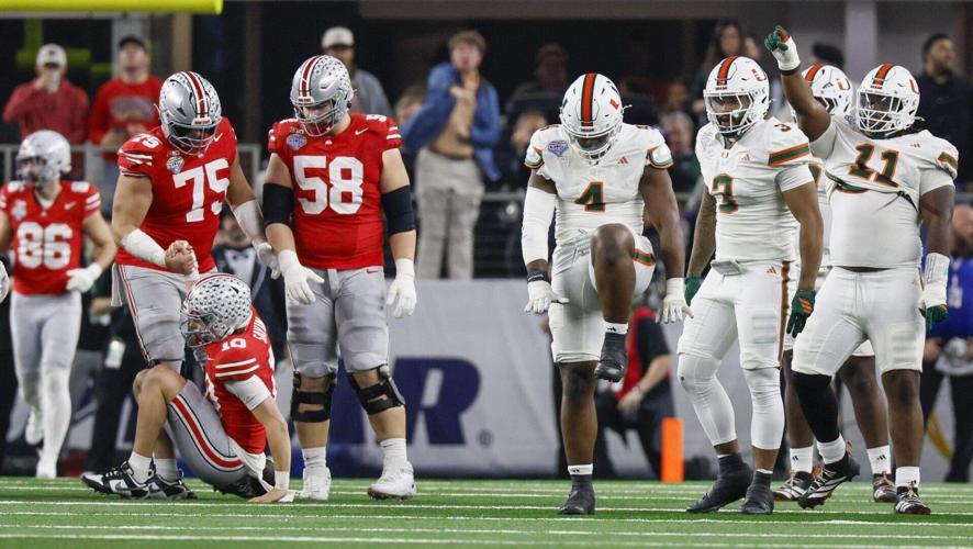 Miami Hurricanes defensive lineman Rueben Bain Jr. reacts after sacking Ohio State Buckeyes quarterback Julian Sayin during the first half of the College Football Playoff quarterfinal game in the Cotton Bowl at AT&T Stadium in Arlington, Texas on Wednes...