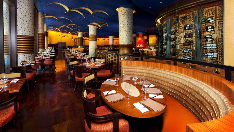The dining room at Jiko- The Cooking Place, located inside Disney's Animal Kingdom Lodge, serves up delights from its crackling, wood-burning ovens and features an award-winning South African wine list.