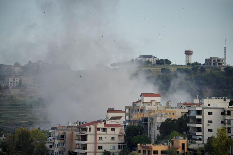 Smoke billows following Israeli strikes, in Nabatieh