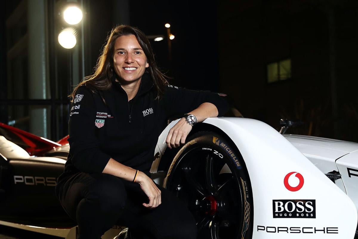 Simona De Silvestro, test and development driver for the TAG Heuer Porsche Formula E Team, pictured with the Porsche 9 XX Electric Formula E car on the occasion of the presentation of the new Porsche Taycan, at Dock 10 Studios on January 23, 2020 in Manchester, England.