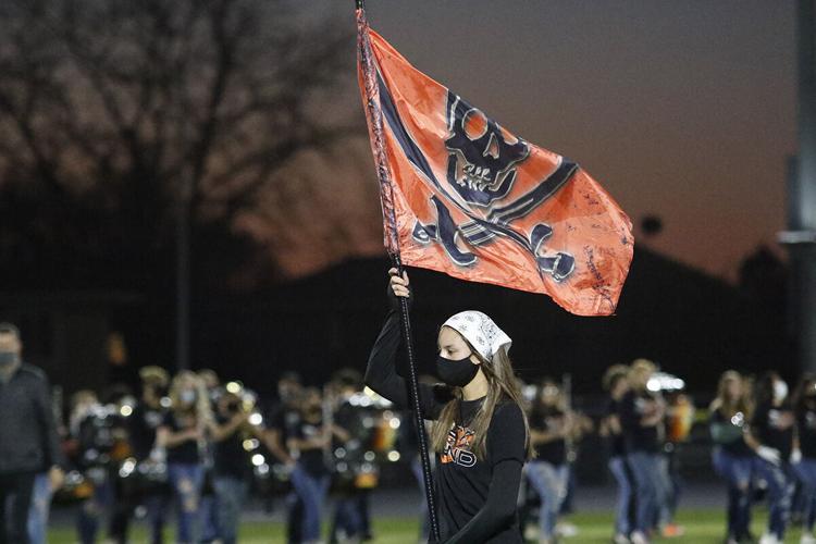 With no competitions to attend, Pride of the Minuteman Marching Band performs for the Lexington community