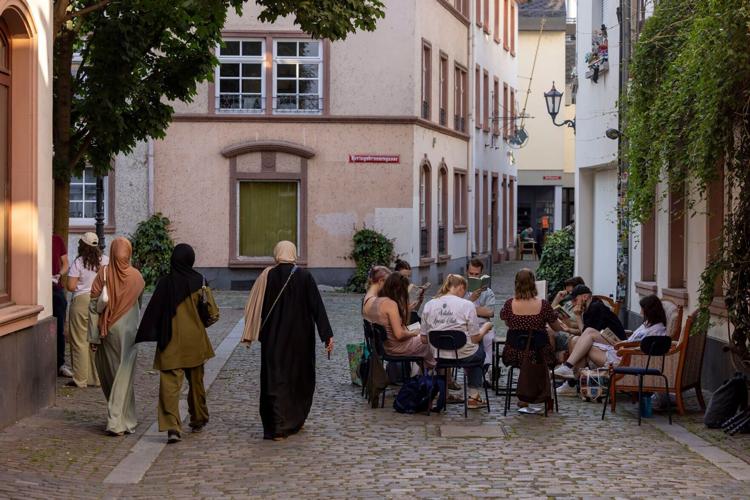 This gathering differs from traditional book clubs: there is no set book and no pressure to read.