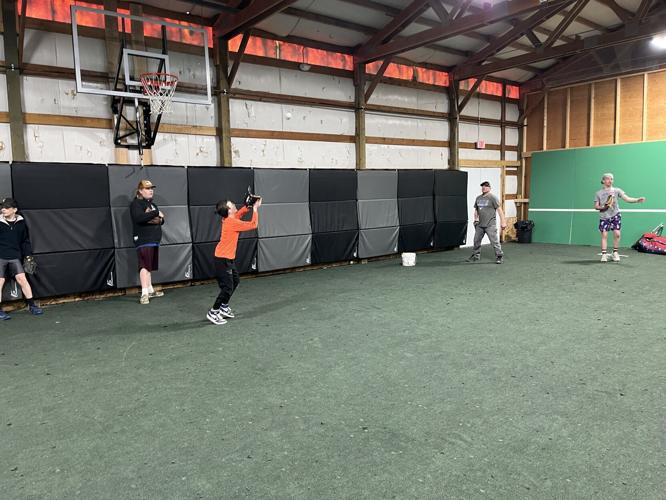 Youth baseball team practices indoors; awaits warmer weather and ...