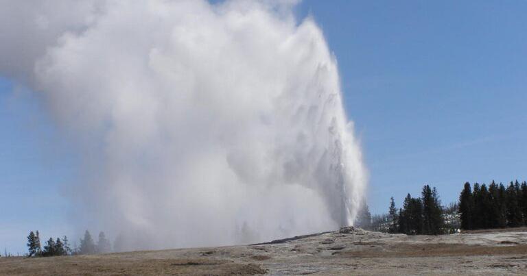 How much water erupts from Old Faithful?