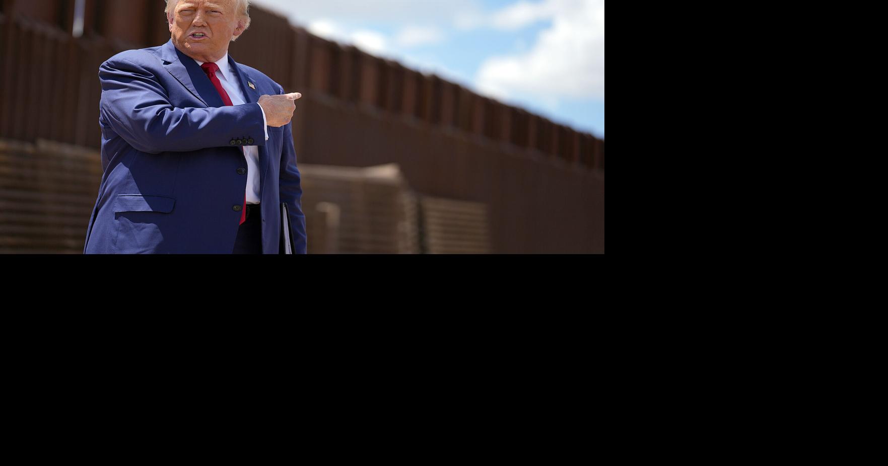 Trump uses a stretch of border wall and a pile of steel beams in ...