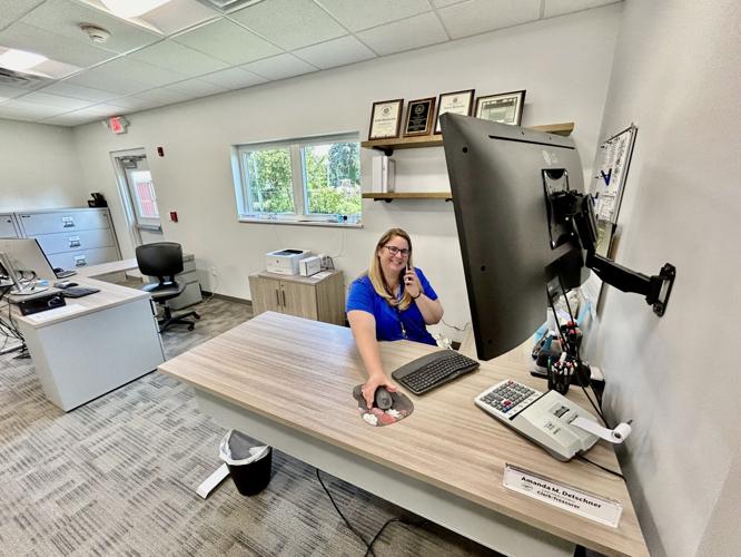 Back where they belong Barker schedules a 'grand opening' of the new