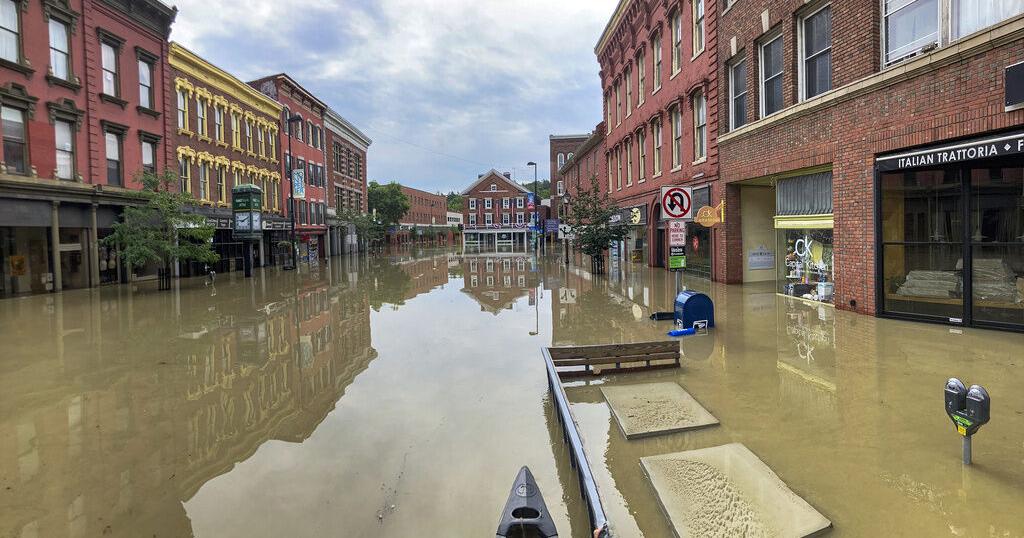 A surging river floods Vermont's capital as crews rescue more than 100 ...