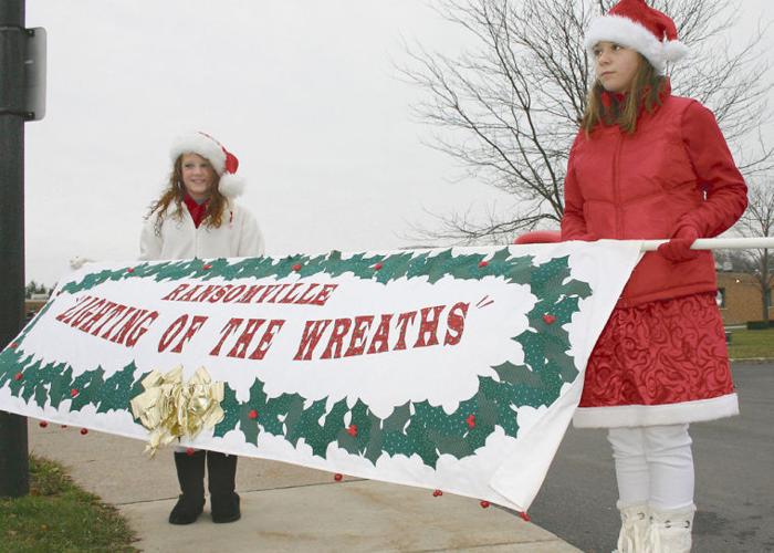 RANSOMVILLE Residents enjoy parade, party at library and lighting of