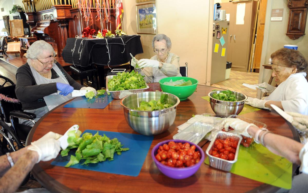 Nursing home residents make meals for needy News