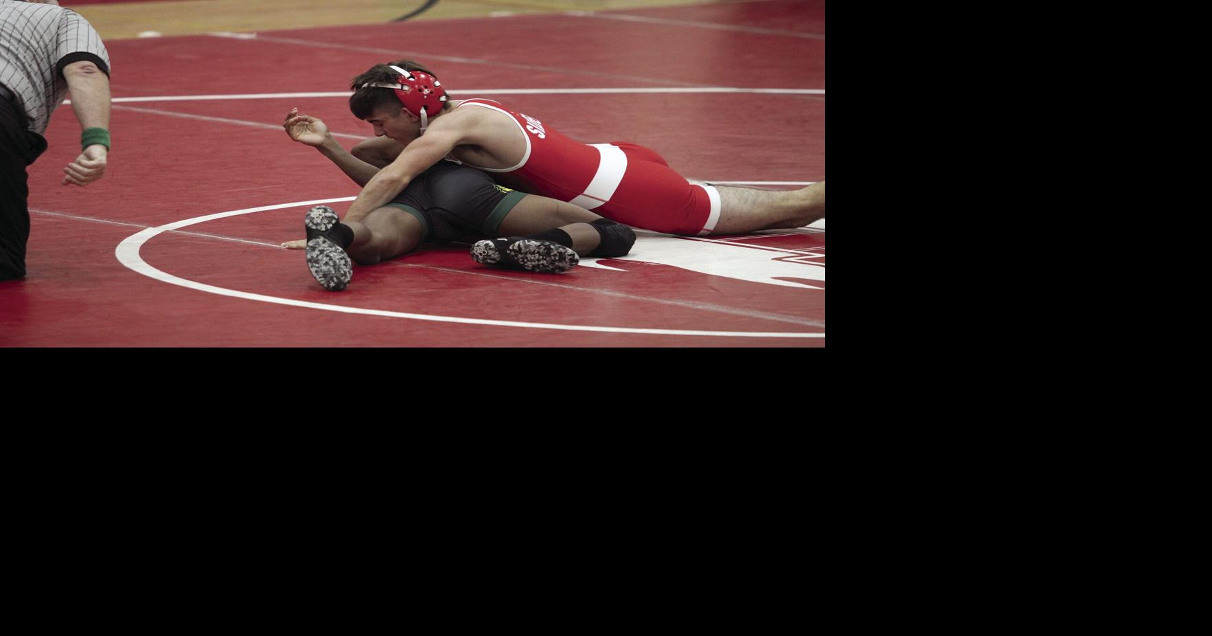 High school wrestling Flames suffer loss to Tracy