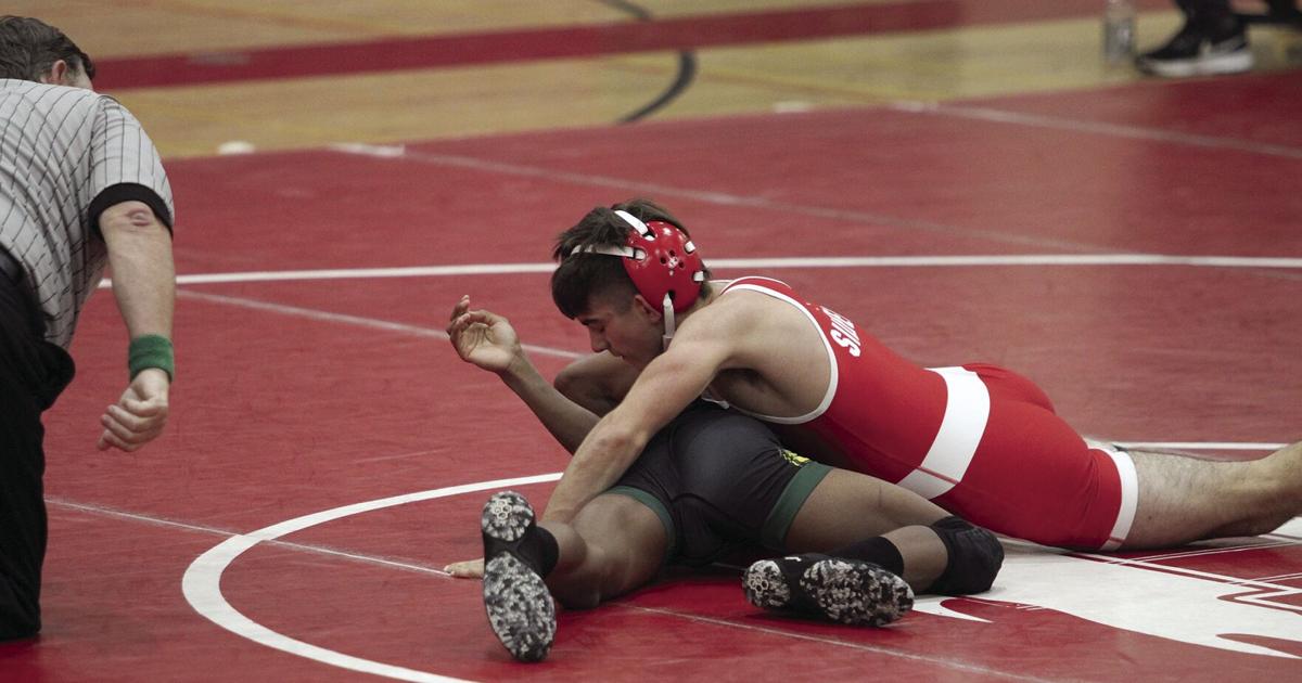 High school wrestling Flames suffer loss to Tracy