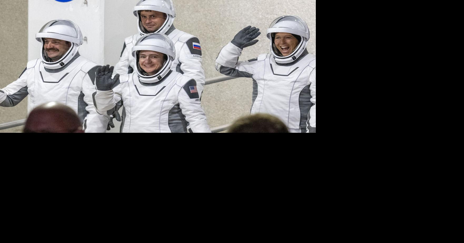 NASA astronauts Jessica Meir, middle, commander, and Jack Hathaway, left, pilot, European Space Agency astronaut Sophie