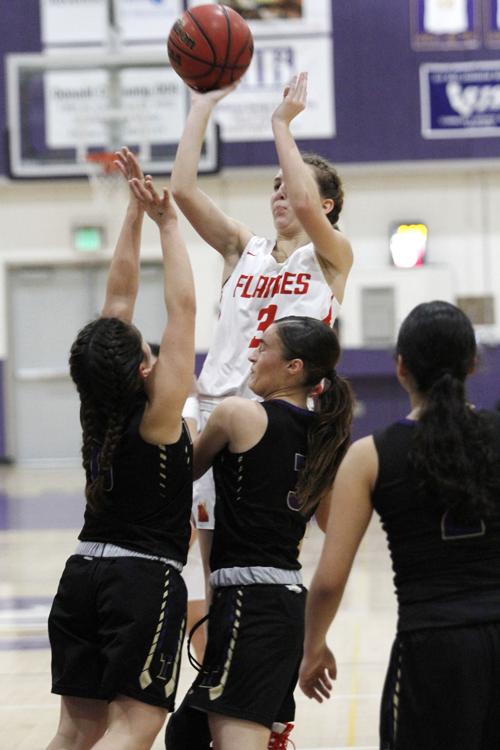 Girls basketball: Flames answer challenge in win against rival Tigers