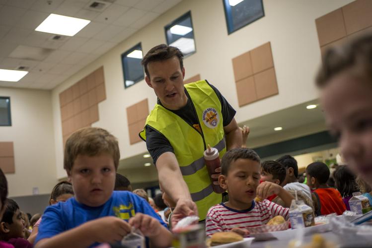 Borchardt Elementary recruits Watch DOGS to help out at the school