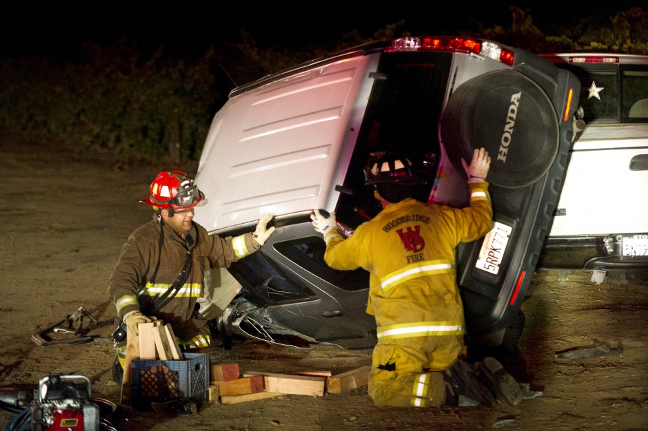 Car flips after hitting tractor News