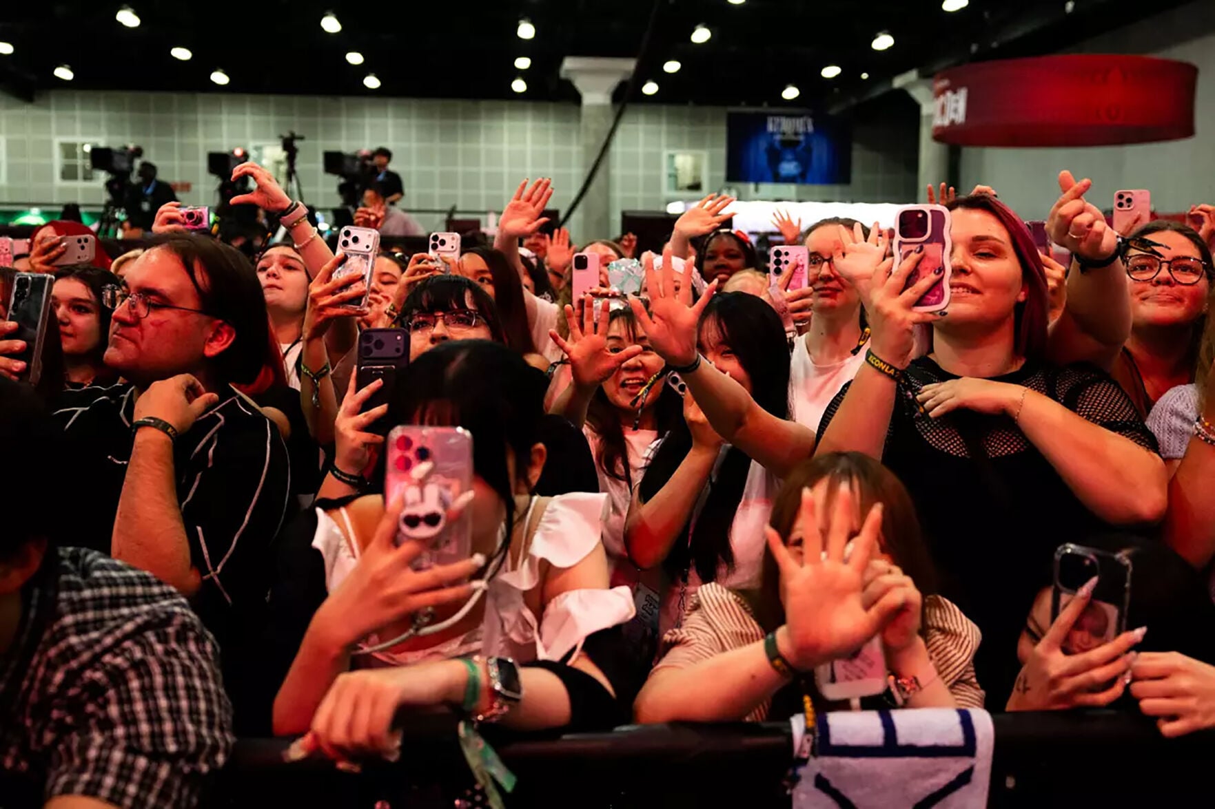 KCON 2026 fans waiting in line at the Los Angeles Convention Center for K-pop performances