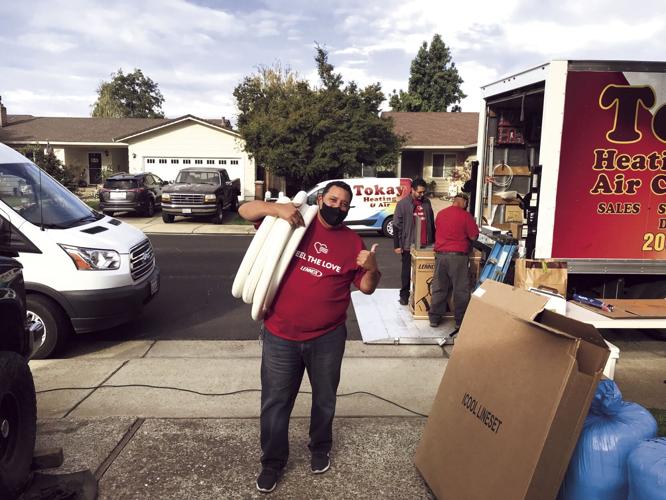 Lodi woman recipient of free heating and air system courtesy of local