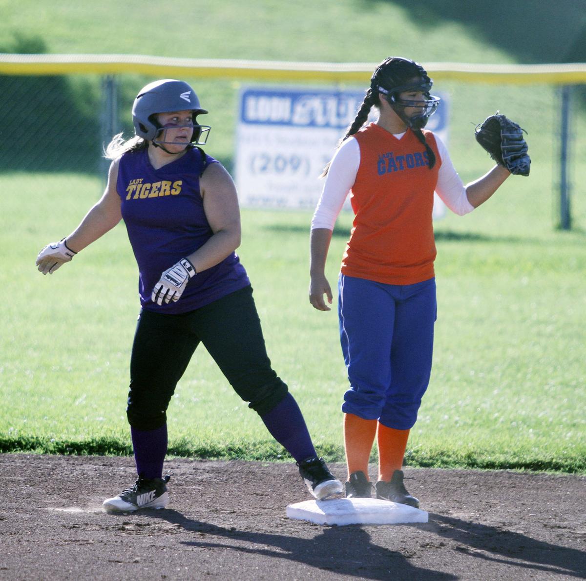 Youth softball championships Tigers snatch victory from Gators
