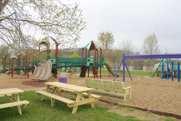 Logan High School students build benches, tables, book boxes