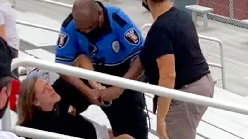Woman arrested after mask dispute at football game asks court to drop charges