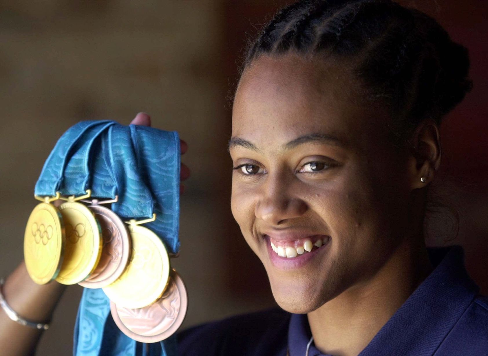 Here's a look at every Olympic gold medal design since 2000