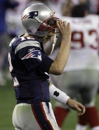 FILE - In this Feb. 3, 2008, file photo, New England Patriots quarterback Tom  Brady (12) throws a pass against the New York Giants during first quarter  of the Super Bowl XLII