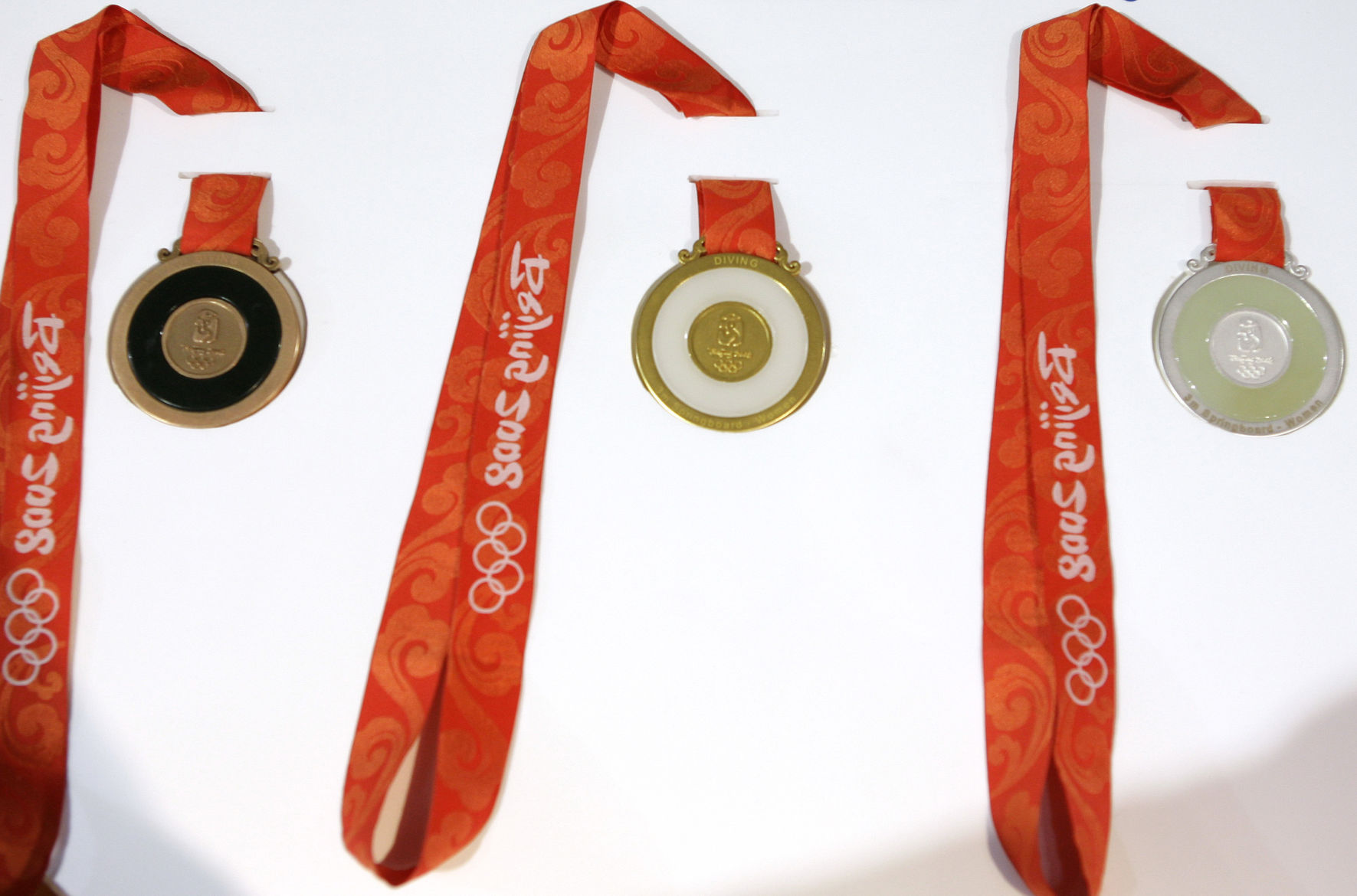 Here's a look at every Olympic gold medal design since 2000