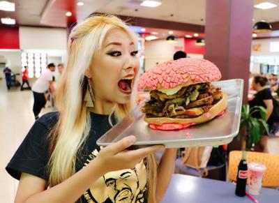 'Aebleskiver Eating Contest' champ, Raina Huang, will take on Santa